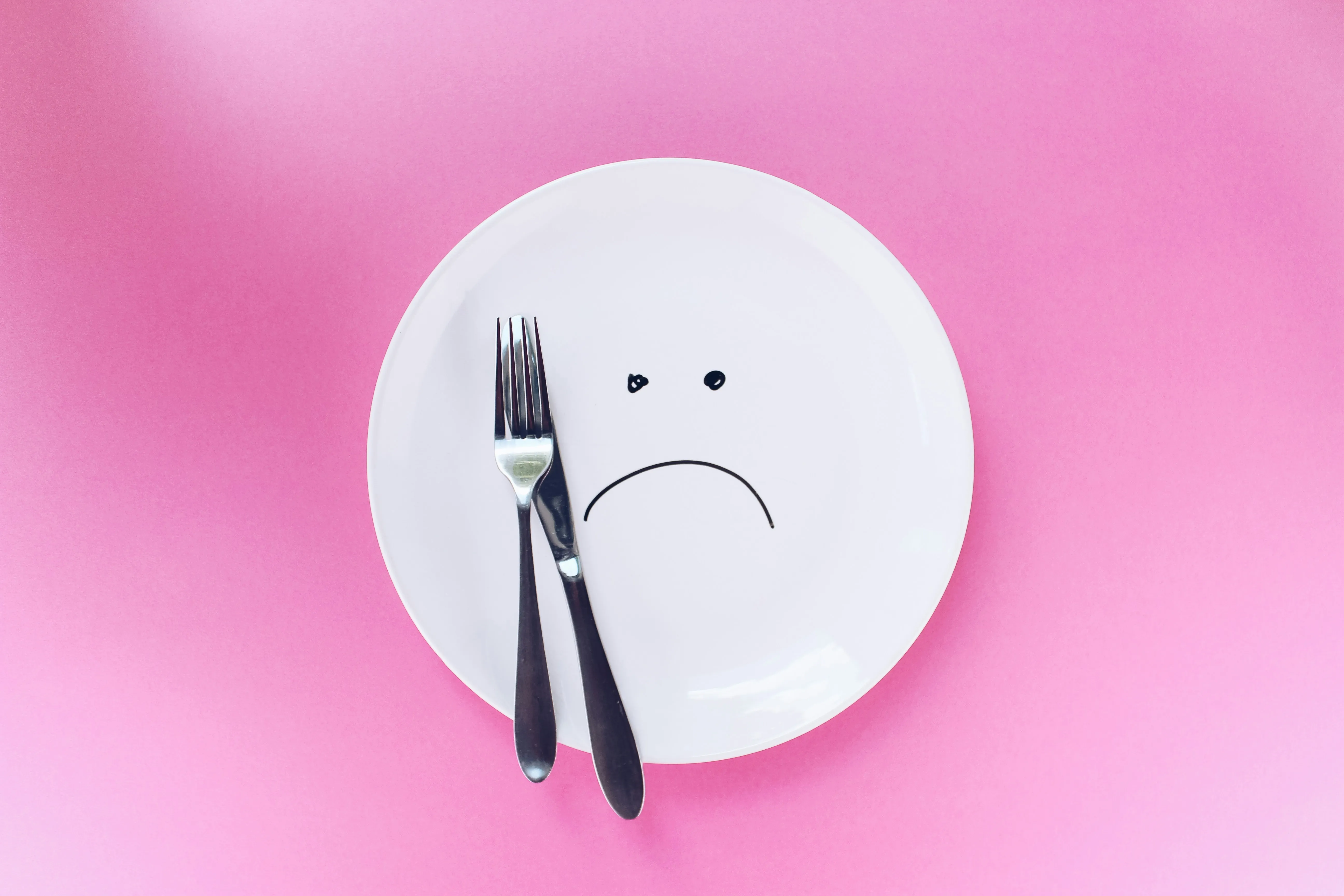 a sad plate with cutlery